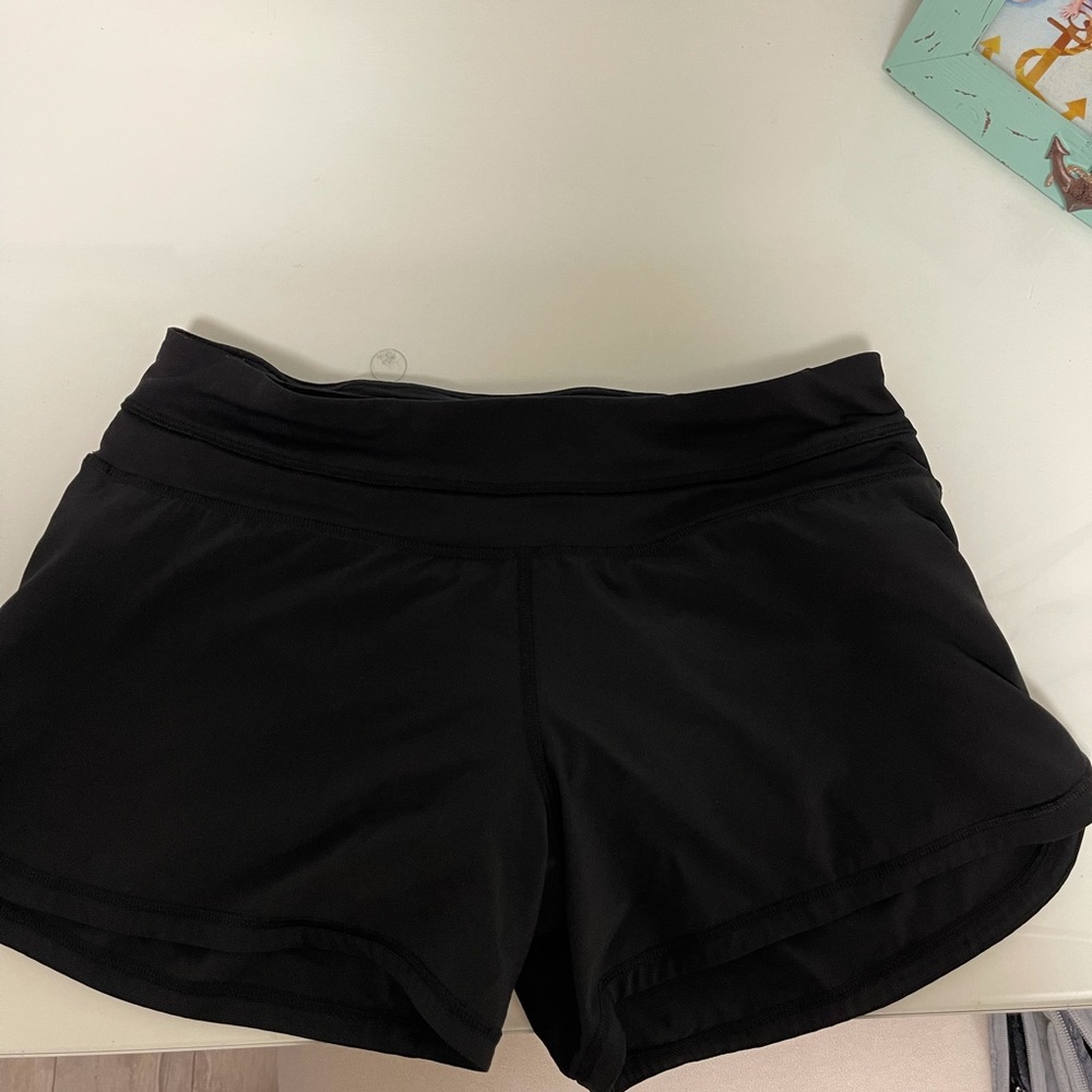 Black lululemon 4” running shorts